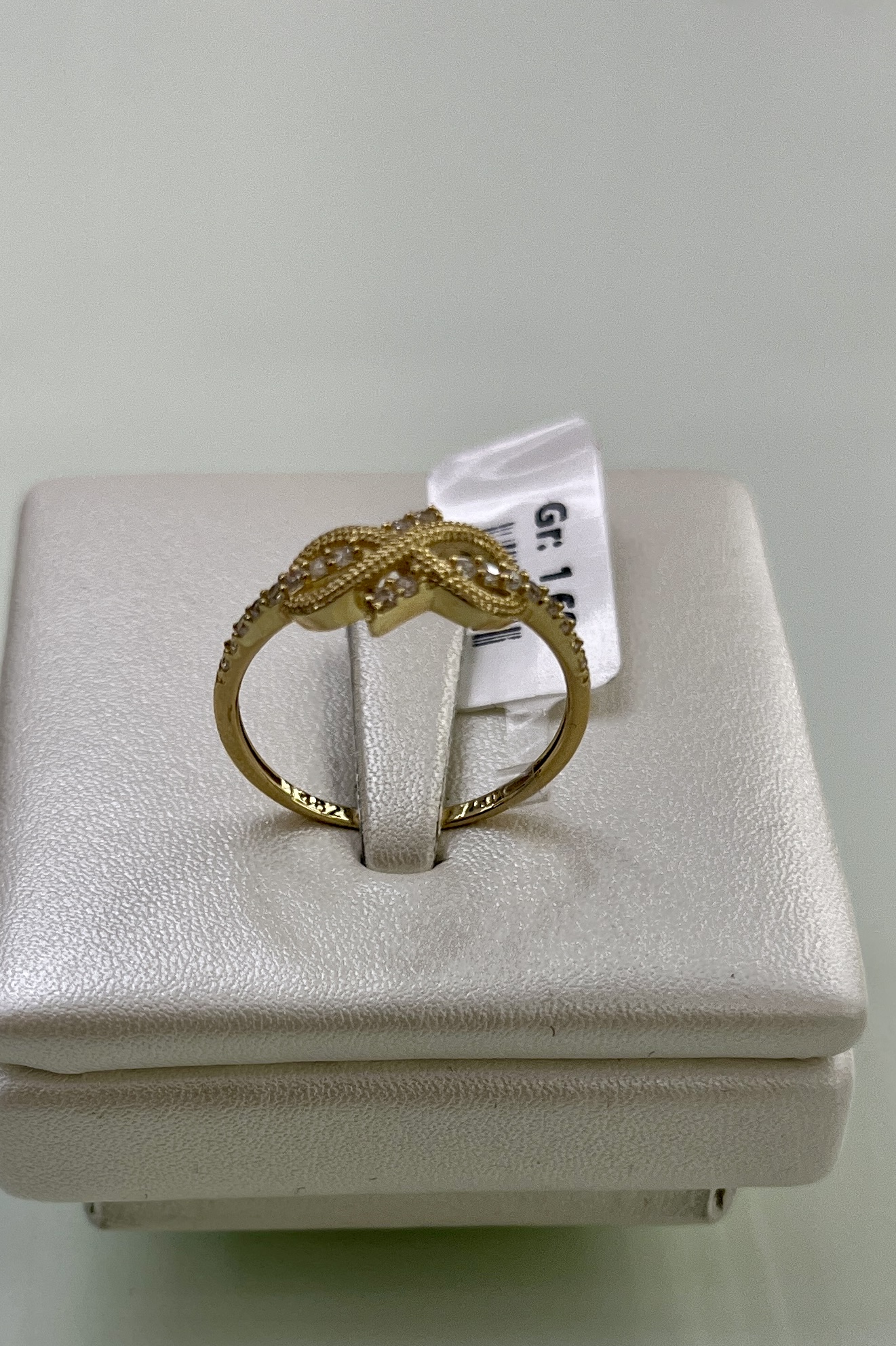 انگشتر طلا ۱۸ عیار نگین دار – مدل‌های زنانه گره بی نهایت – گالری طلای پارسین