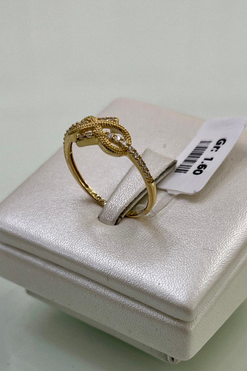 انگشتر طلا ۱۸ عیار نگین دار – مدلهای زنانه گره بی نهایت – گالری طلای پارسین